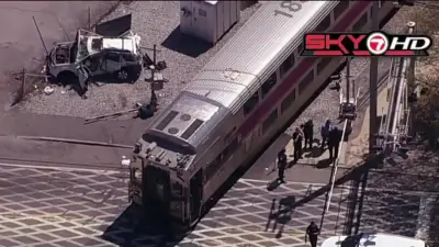 1 dead after SUV hit by MBTA train in Abington