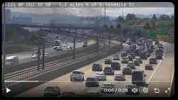 Grass fire burning along I-225 near RTD station under control, officials say